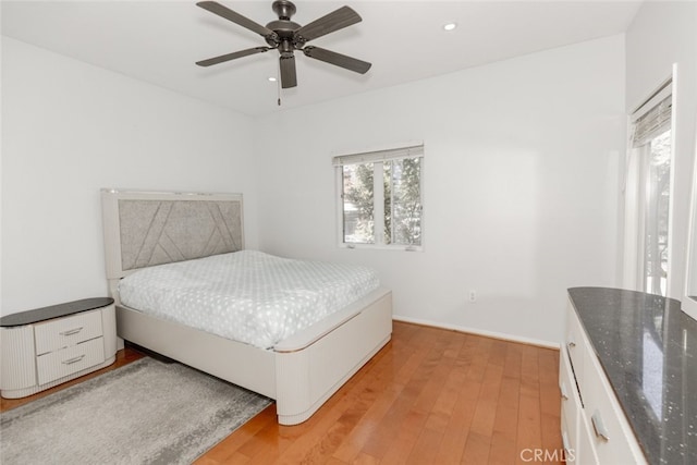 11124 Burbank Blvd Unit 101, North Hollywood, CA 91601 - bedroom featuring multiple windows, light wood-style floors, recessed lighting, and ceiling fan
