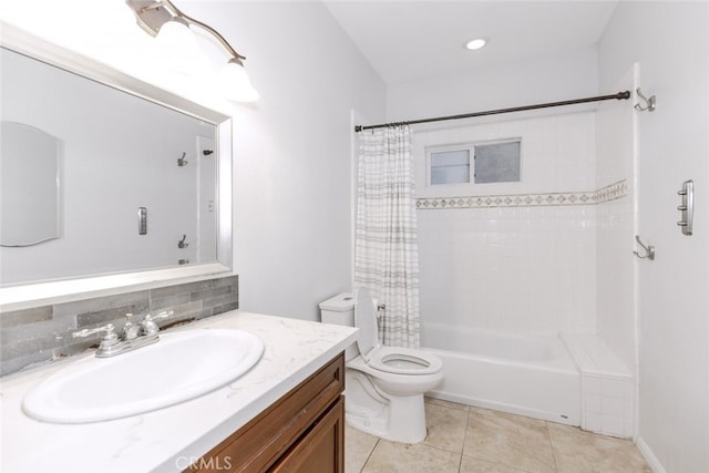 11124 Burbank Blvd Unit 101, North Hollywood, CA 91601 - full bath with shower / tub combo with curtain, vanity, tile patterned floors, and tasteful backsplash