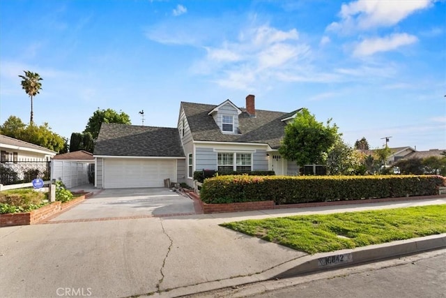 16842 Liggett St, Los Angeles, CA 91343 - view of front of house with concrete driveway, a garage, a chimney, and a shingled roof