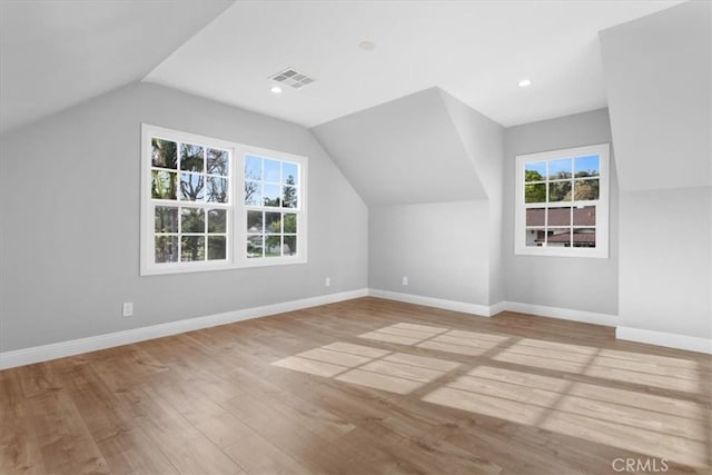 16842 Liggett St, Los Angeles, CA 91343 - additional living space with plenty of natural light, lofted ceiling, and wood finished floors