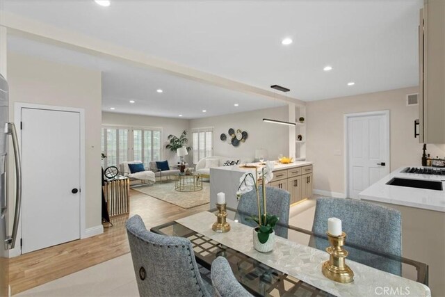 16842 Liggett St, Los Angeles, CA 91343 - dining area featuring recessed lighting and light wood-type flooring