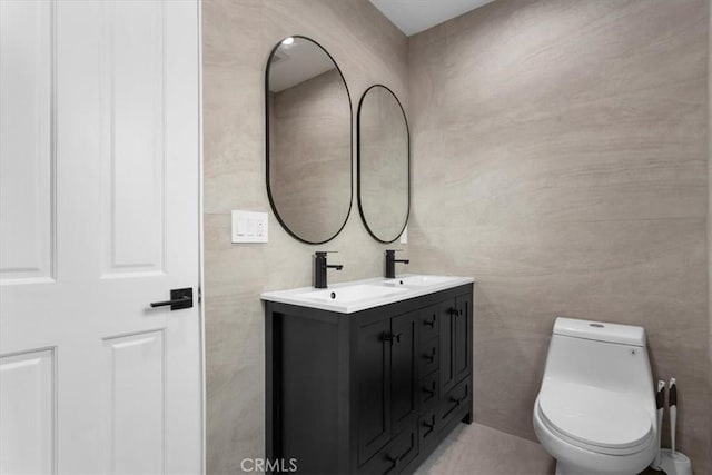 16842 Liggett St, Los Angeles, CA 91343 - bathroom with double vanity and toilet