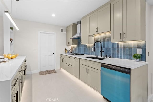 16842 Liggett St, Los Angeles, CA 91343 - kitchen with dishwashing machine, wall chimney exhaust hood, tasteful backsplash, stainless steel gas stovetop, and light stone countertops