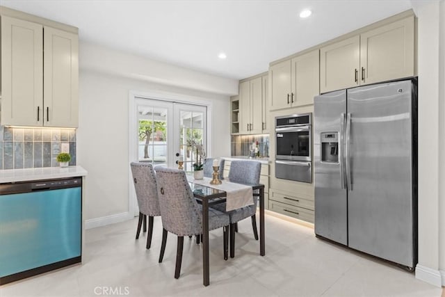 16842 Liggett St, Los Angeles, CA 91343 - dining room featuring french doors and recessed lighting