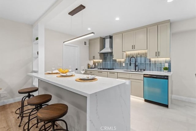 16842 Liggett St, Los Angeles, CA 91343 - kitchen featuring dishwasher, wall chimney exhaust hood, black stovetop, a breakfast bar, and tasteful backsplash