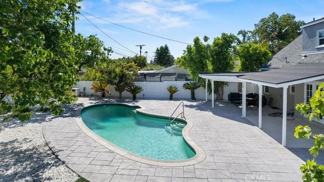 16842 Liggett St, Los Angeles, CA 91343 - view of pool featuring a patio area and a fenced backyard