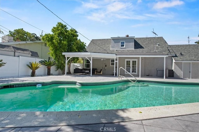 16842 Liggett St, Los Angeles, CA 91343 - outdoor pool featuring french doors and a patio