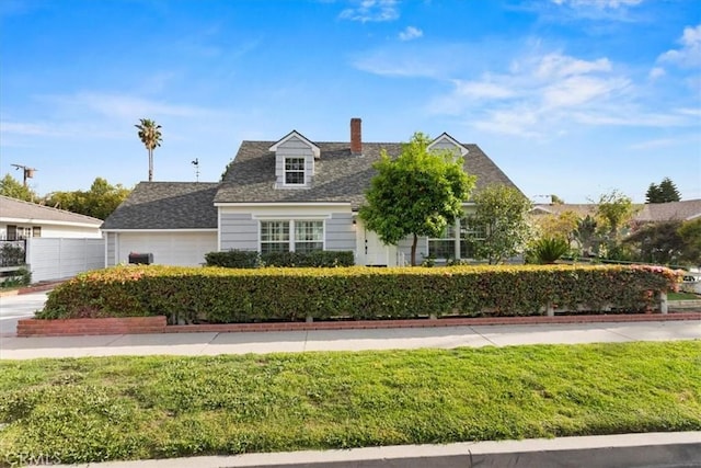 16842 Liggett St, Los Angeles, CA 91343 - view of front of house featuring a front yard and a chimney