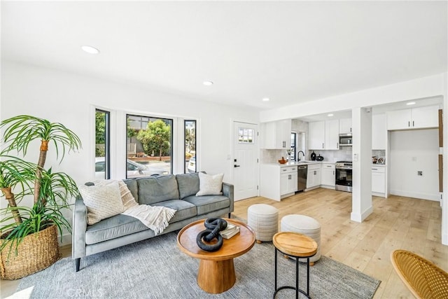 33871 Copper Lantern St, Dana Point, CA 92629 - living area featuring light wood-type flooring and recessed lighting