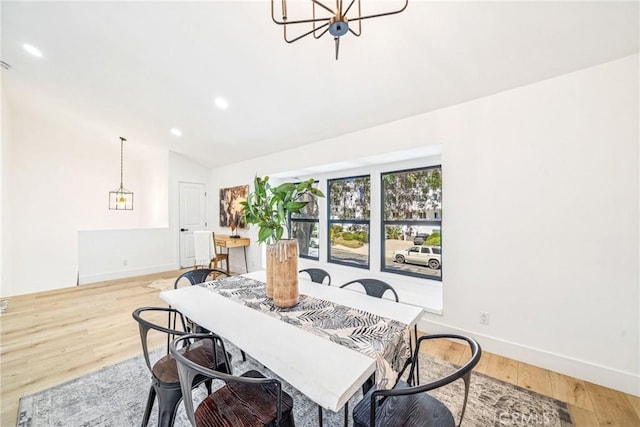 33871 Copper Lantern St, Dana Point, CA 92629 - dining area featuring a chandelier, wood finished floors, vaulted ceiling, and recessed lighting