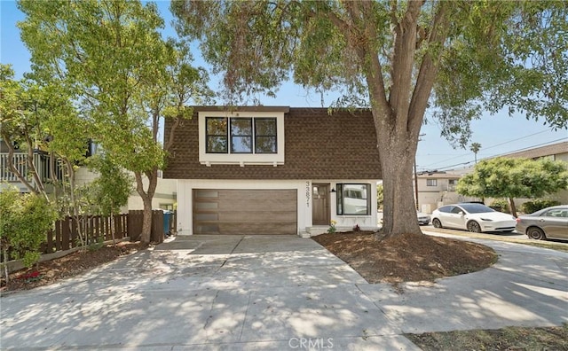 33871 Copper Lantern St, Dana Point, CA 92629 - view of property with an attached garage and concrete driveway