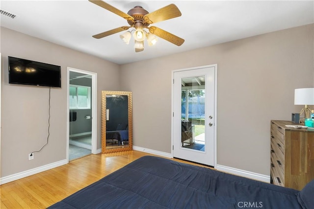 5055 Blanchard Dr, Riverside, CA 92504 - unfurnished bedroom with wood finished floors, access to exterior, ceiling fan, and ensuite bathroom