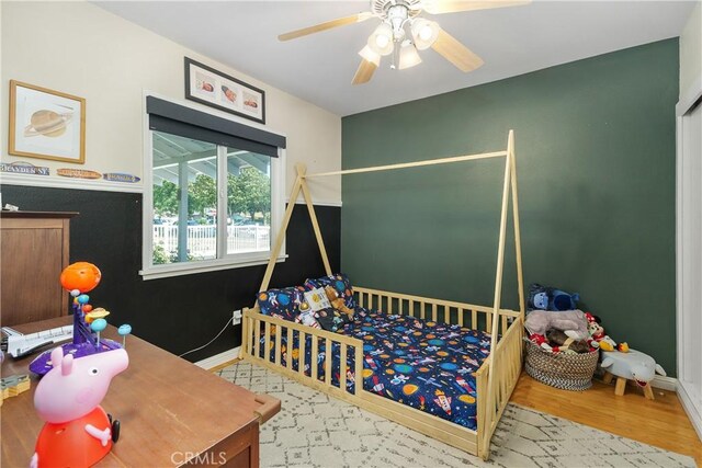 5055 Blanchard Dr, Riverside, CA 92504 - bedroom featuring wood finished floors and a ceiling fan
