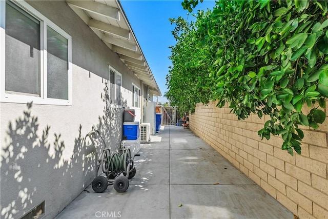 5055 Blanchard Dr, Riverside, CA 92504 - view of home's exterior featuring stucco siding and a patio area