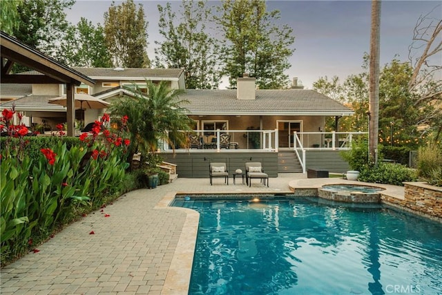 9911 Overhill Dr, North Tustin, CA 92705 - view of swimming pool featuring a deck, a patio, and a pool with connected hot tub