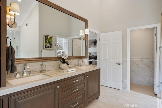 9911 Overhill Dr, North Tustin, CA 92705 - bathroom with crown molding, double vanity, and tile patterned flooring