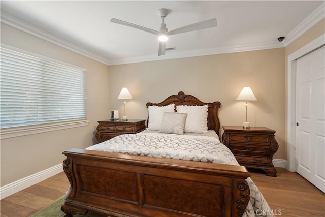 9911 Overhill Dr, North Tustin, CA 92705 - bedroom featuring light wood-style floors, crown molding, ceiling fan, and a closet
