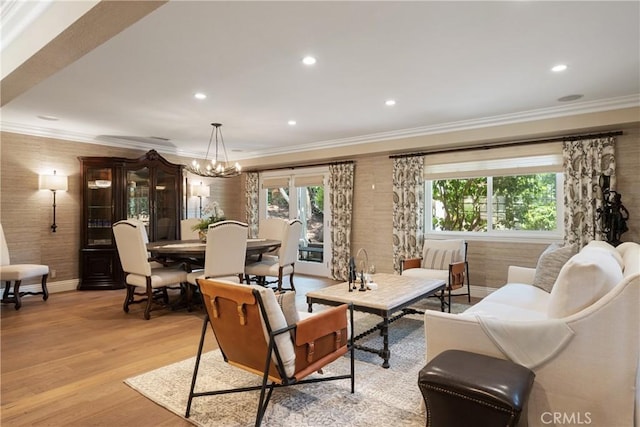 9911 Overhill Dr, North Tustin, CA 92705 - living room with crown molding, light wood-style floors, a chandelier, and recessed lighting