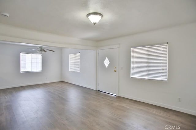 531 W 61st St, Los Angeles, CA 90044 - entrance foyer featuring a ceiling fan and wood finished floors