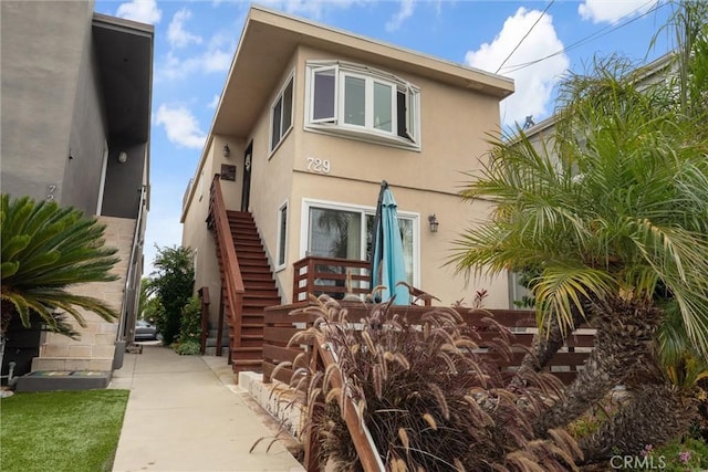 729 Longfellow Ave, Hermosa Beach, CA 90254 - view of home's exterior with stairs and stucco siding
