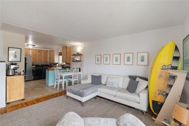 729 Longfellow Ave, Hermosa Beach, CA 90254 - living area featuring light wood-style floors and a textured ceiling