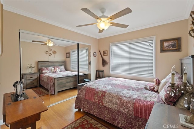 729 Longfellow Ave, Hermosa Beach, CA 90254 - bedroom featuring light wood-style floors, crown molding, a closet, and ceiling fan