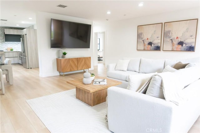 539 Avon Ave, Pasadena, CA 91105 - living area with light wood-style floors and recessed lighting