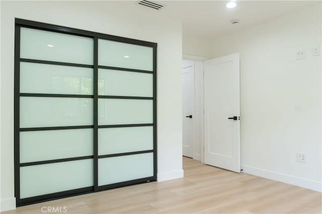 539 Avon Ave, Pasadena, CA 91105 - unfurnished bedroom with light wood-style floors and recessed lighting