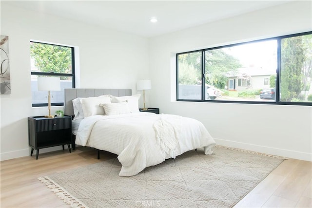 539 Avon Ave, Pasadena, CA 91105 - bedroom featuring multiple windows, wood finished floors, and recessed lighting