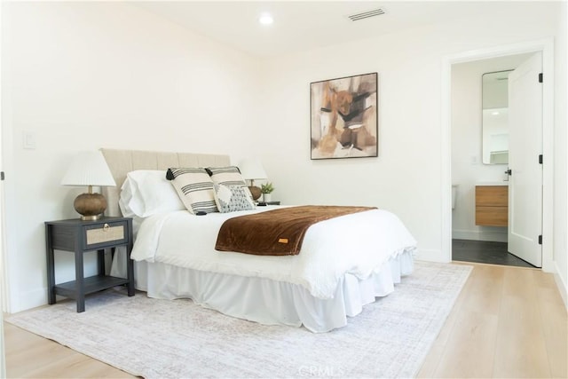 539 Avon Ave, Pasadena, CA 91105 - bedroom featuring wood finished floors, ensuite bathroom, and recessed lighting