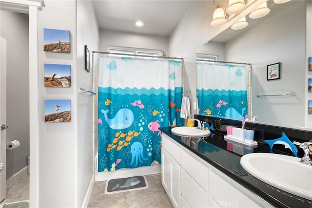 3109 Rae Creek Dr, Chico, CA 95973 - bathroom with double vanity, tile patterned flooring, recessed lighting, and shower / bath combo