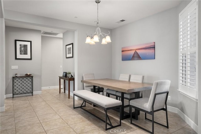 3109 Rae Creek Dr, Chico, CA 95973 - dining space featuring a chandelier, light tile patterned floors, and healthy amount of natural light