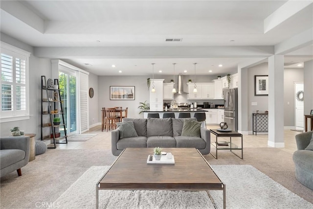 3109 Rae Creek Dr, Chico, CA 95973 - living room featuring light colored carpet, recessed lighting, and a tray ceiling