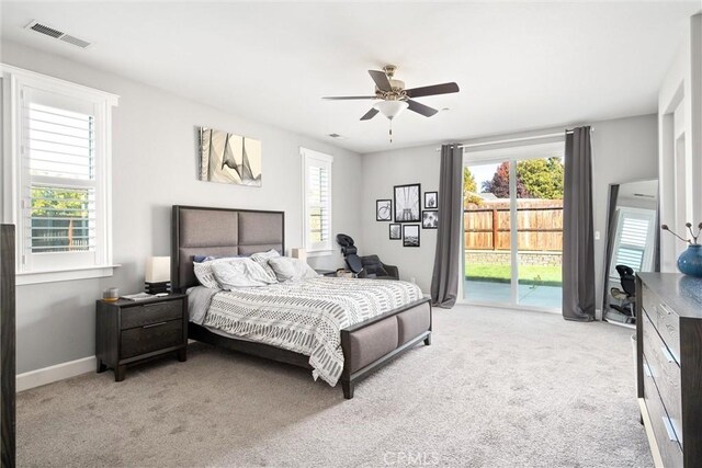 3109 Rae Creek Dr, Chico, CA 95973 - bedroom with light colored carpet, access to outside, and a ceiling fan