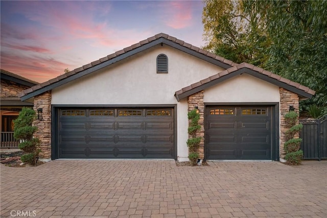 235 Verbena Ln, Brea, CA 92823 - view of front of property with stucco siding, decorative driveway, and stone siding