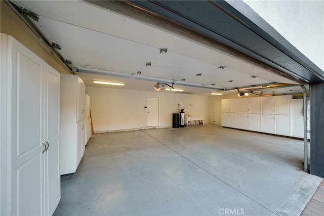 235 Verbena Ln, Brea, CA 92823 - garage featuring a garage door opener