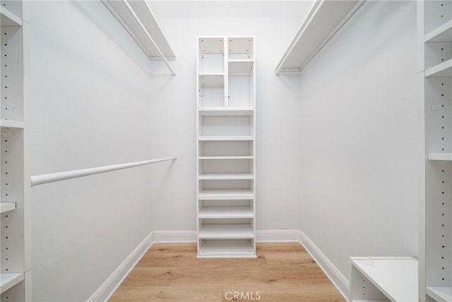 235 Verbena Ln, Brea, CA 92823 - spacious closet featuring wood finished floors