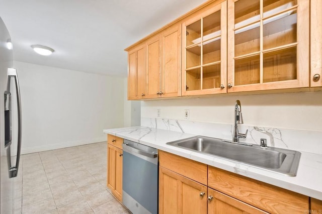 2850 Reynard Way Unit 10, San Diego, CA 92103 - kitchen featuring stainless steel appliances, light brown cabinetry, light countertops, and glass insert cabinets