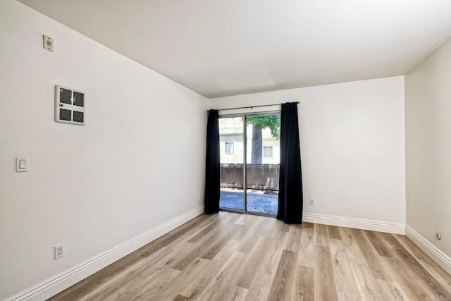 2850 Reynard Way Unit 10, San Diego, CA 92103 - spare room featuring light wood-style flooring and baseboards