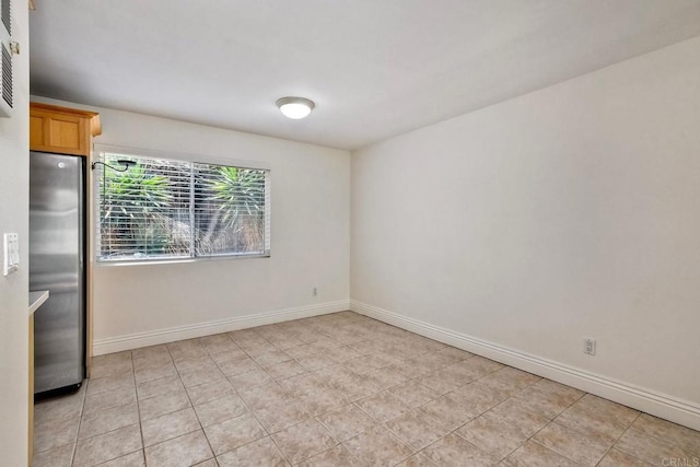 2850 Reynard Way Unit 10, San Diego, CA 92103 - unfurnished room with baseboards and light tile patterned flooring