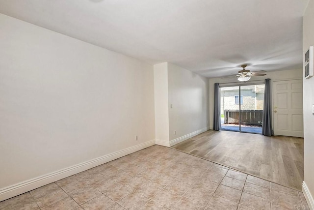 2850 Reynard Way Unit 10, San Diego, CA 92103 - spare room with ceiling fan and light tile patterned floors