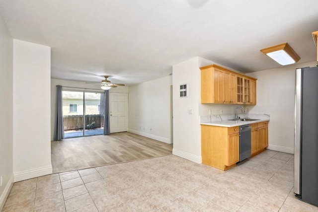 2850 Reynard Way Unit 10, San Diego, CA 92103 - kitchen with appliances with stainless steel finishes, light countertops, a ceiling fan, light tile patterned floors, and open floor plan