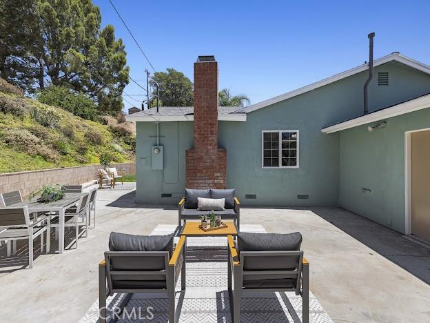 22601 Aguadero Pl, Saugus, CA 91350 - view of patio with an outdoor hangout area and outdoor dining area