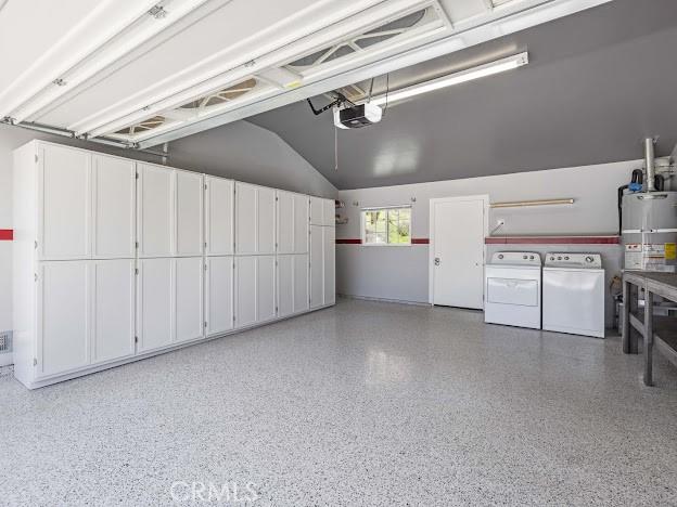 22601 Aguadero Pl, Saugus, CA 91350 - garage featuring independent washer and dryer, a garage door opener, and water heater