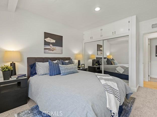 22601 Aguadero Pl, Saugus, CA 91350 - bedroom featuring a closet, light colored carpet, and recessed lighting