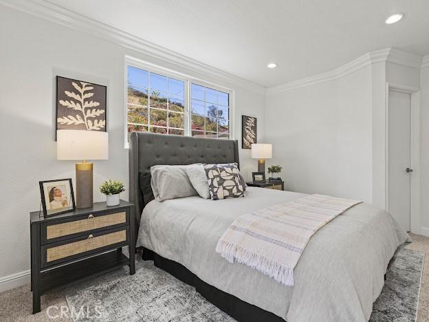 22601 Aguadero Pl, Saugus, CA 91350 - carpeted bedroom featuring crown molding and recessed lighting