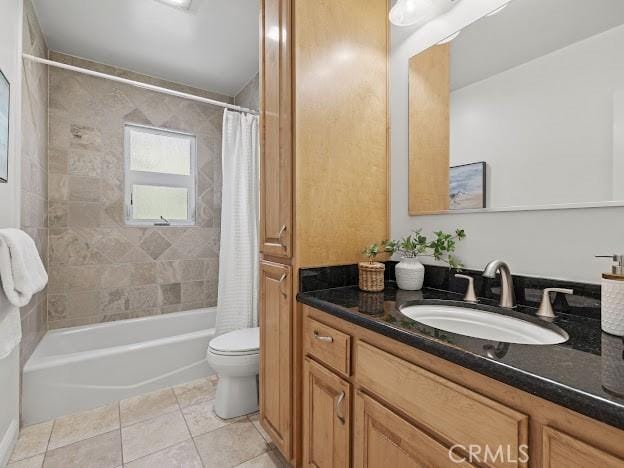 22601 Aguadero Pl, Saugus, CA 91350 - full bathroom featuring vanity, shower / bath combo with shower curtain, and tile patterned floors