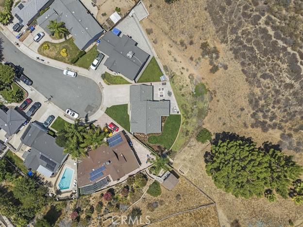 22601 Aguadero Pl, Saugus, CA 91350 - aerial view of property's location with a pool
