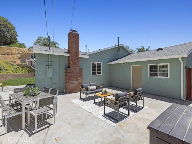 22601 Aguadero Pl, Saugus, CA 91350 - view of patio with outdoor lounge area and outdoor dining space