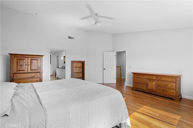 1317 Mill Creek Ct, Thousand Oaks, CA 91360 - bedroom with light wood-style floors, high vaulted ceiling, ensuite bath, and a ceiling fan